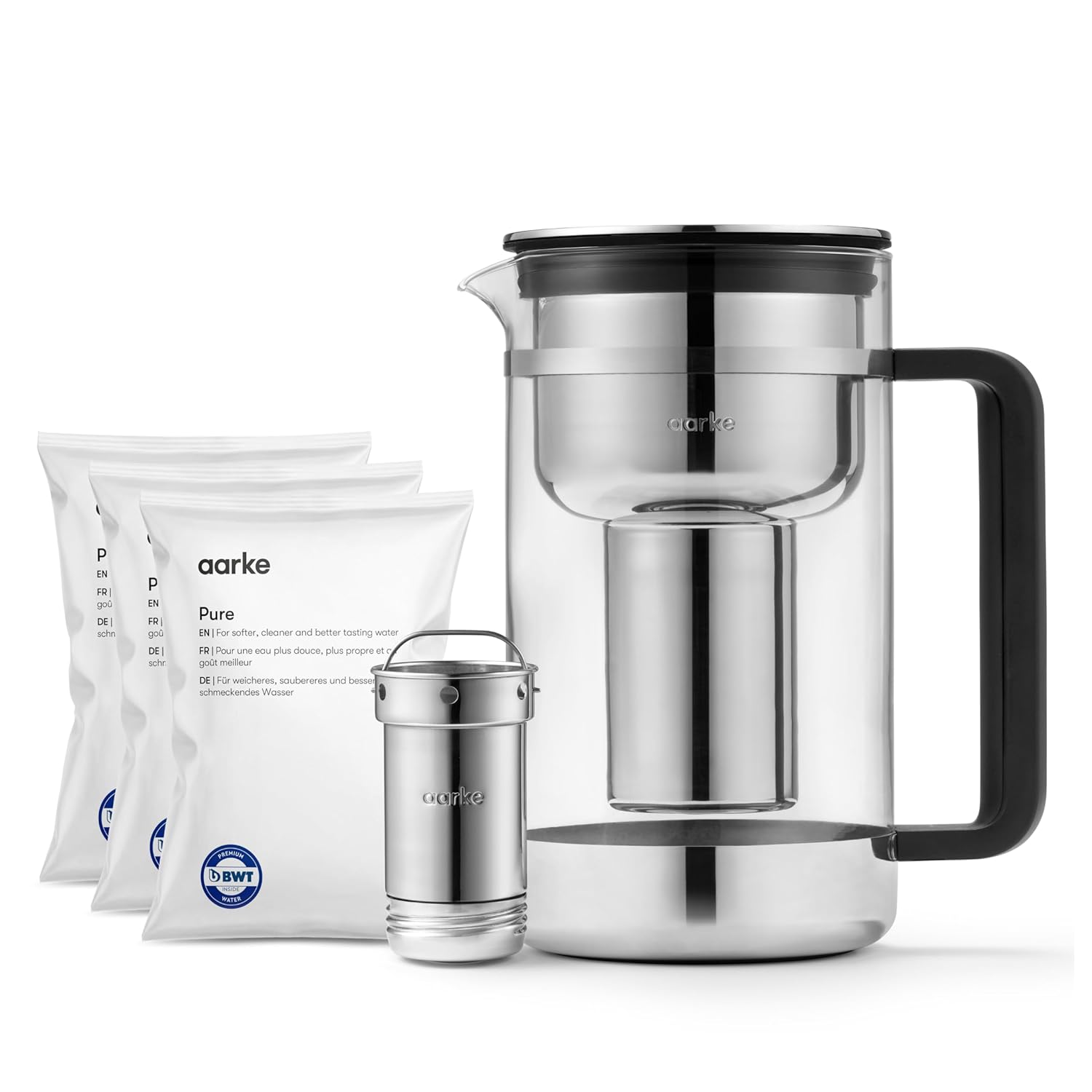 Installing Aarke Water Filter Pitcher Glass Stainless Steel Purifier on a wooden desk